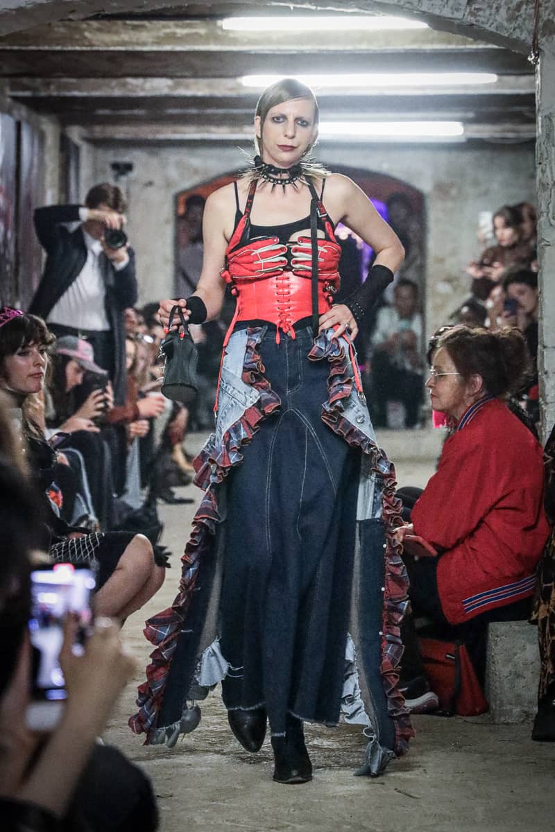 Pandora Art Gallery industrial runway event with edgy aesthetic for high-impact fashion show.