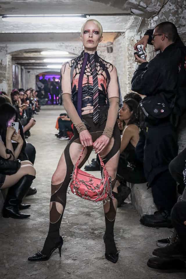 Pandora Art Gallery underground runway show: industrial fashion event venue.