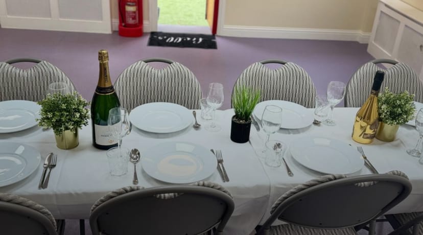Intimate table setting at Toucan Day Services venue, perfect for small social gathering events.