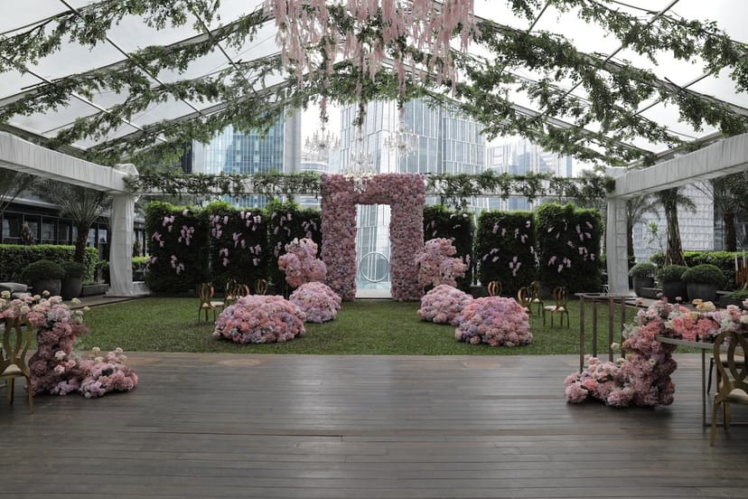 Luxury marquee ballroom with floral decor for elegant wedding ceremonies and corporate events.
