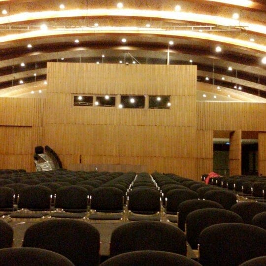 Annex Room 8 Jakarta auditorium with wood-paneled wall, ideal for corporate events and seminars.