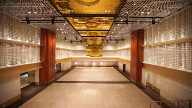 Thamrin Nine Ballroom with gold-leaf ceiling, ideal for luxury gala dinners and conferences.