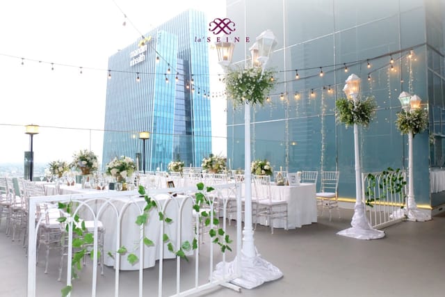 La Seine Hall rooftop event space with bistro lighting for upscale corporate and social functions.