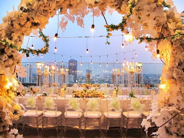 Rooftop event setup with floral archways for luxury weddings and outdoor galas at La Seine Hall.