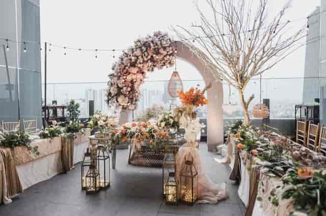 Rooftop floral arch at La Seine Hall for high-end outdoor wedding and corporate event venue.