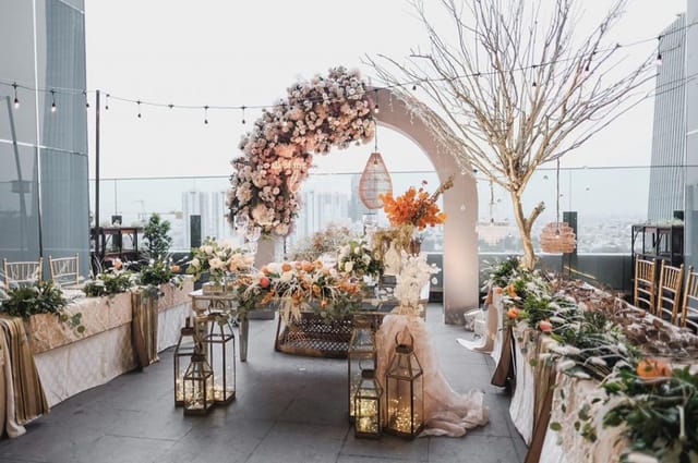 Rooftop floral arch at La Seine Hall for high-end outdoor wedding and corporate event venue.