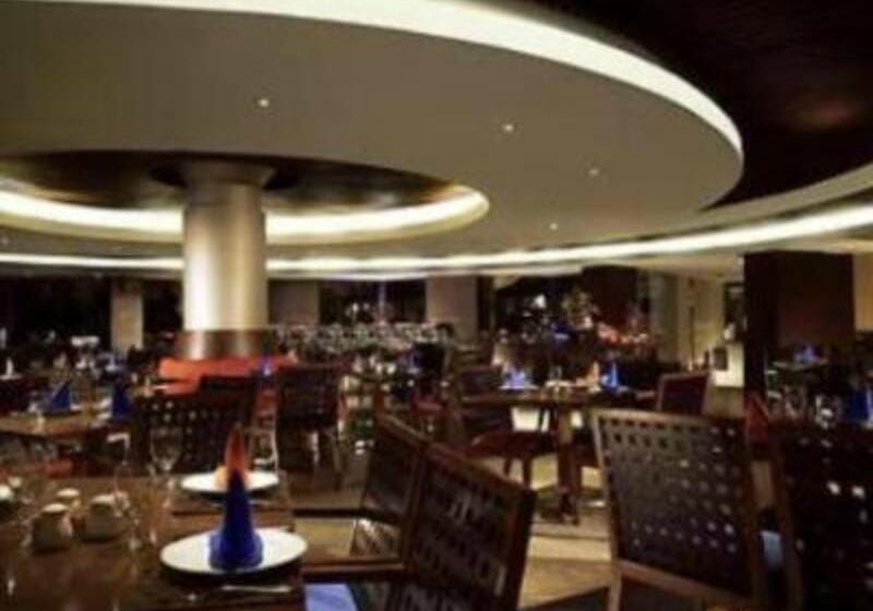 Luxury meeting room at Mercure Convention Center with circular ceiling for corporate events.