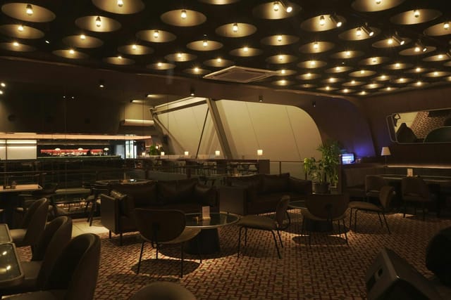 Mantra Space private office: mid-century modern lounge for VIP networking and corporate receptions.