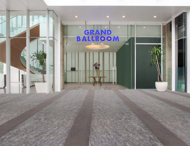 JS Luwansa Hotel Grand Ballroom: minimalist pre-function space for corporate events and weddings.