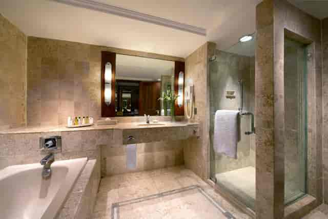 Luxury stone bathroom in The Sultan Hotel Jakarta for VIP accommodation and hotel room blocks.