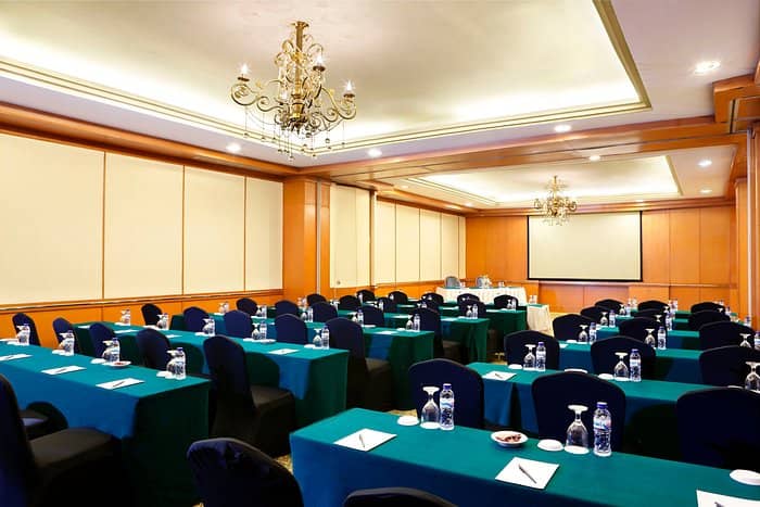Classroom meeting room in Grand Sahid Jaya Jakarta with wood panels for corporate seminars.