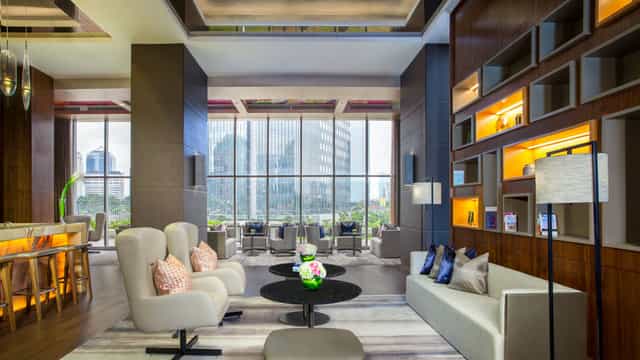 Modern meeting room in Ascott Sudirman Jakarta with natural light for VIP events and networking.