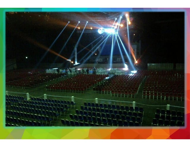 Multifunction Hall theater setup with stage truss lighting for keynote presentations and events.