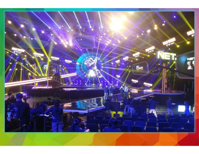 Multifunction Hall stage with dynamic lighting for broadcast event production and venue rental.