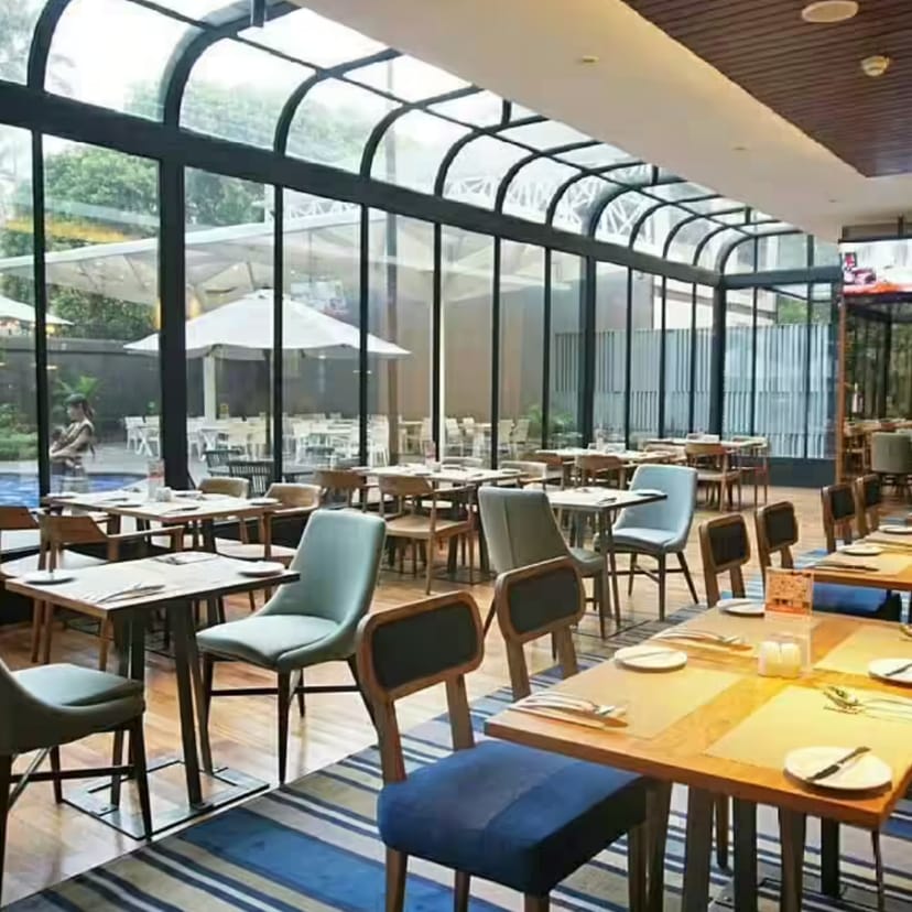 Swiss-Café indoor-outdoor restaurant for corporate events and networking breakfast gatherings.