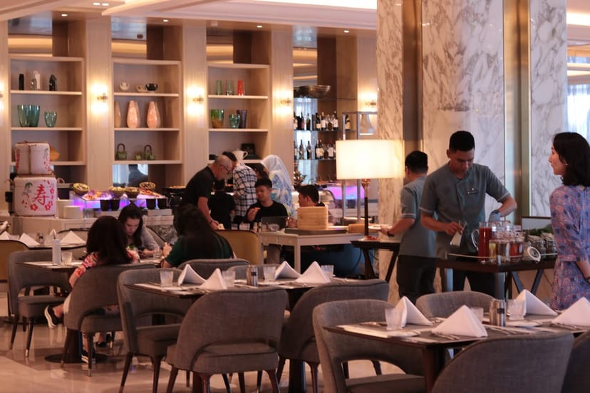 Upscale Sugar & Spice restaurant buffet, intimate seating for networking and group dining events.