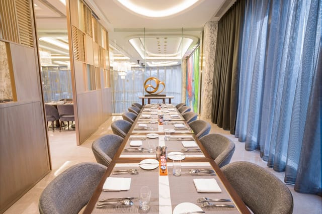 High-end boardroom at Sugar & Spice for executive meetings and corporate luncheons.