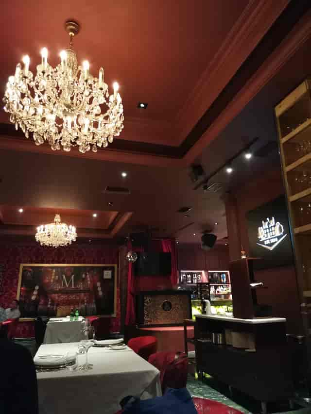 Ambrosia Private Club with crystal chandeliers for luxury VIP receptions and networking events.