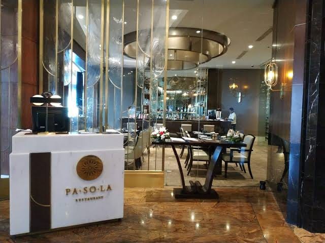 Elegant PA.SO.LA restaurant entrance, ideal for VIP networking dinners and executive breakfasts.