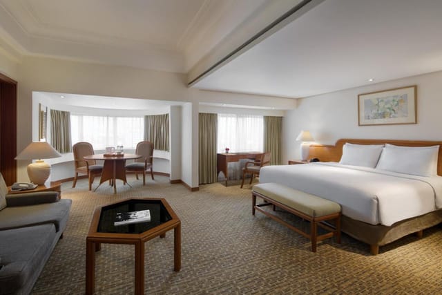 Executive suite at Aryaduta Menteng with workspace, ideal for business travel and VIP events.