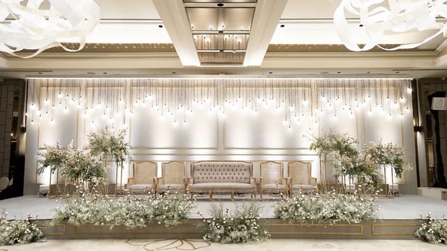 Luxury Grand Ballroom stage with floral decor for weddings and corporate events in Jakarta.
