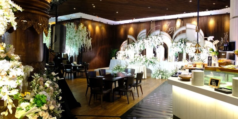 Rasa Restaurant banquet hall with elegant floral decor for luxury weddings and corporate galas.