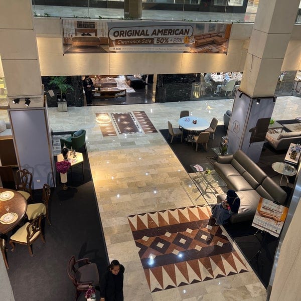 High-end Jakarta showroom with modular lounge setups for networking events and corporate activations.