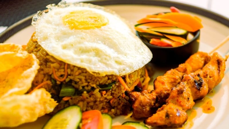Nasi Goreng with satay lunch entrée at Restoran Incanto, ideal for Jakarta event catering.