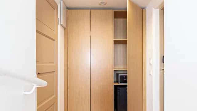 Radisson Blu Aleksanteri hotel meeting room with built-in safe and fridge for VIP business events.