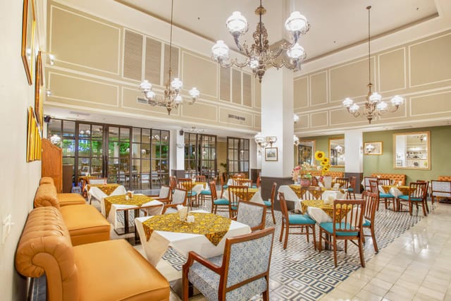 High-ceilinged Bistro at Hotel Des Indes Menteng, ideal for social luncheons and breakout sessions.