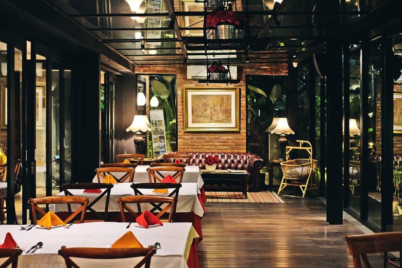 Private dining room in Patio Jakarta: Sophisticated lounge for executive retreats and events.
