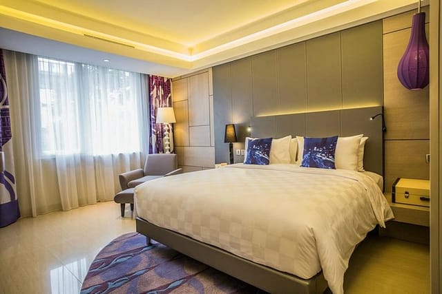 Modern hotel meeting room at Mercure Jakarta Sabang with ambient lighting for conferences and events.