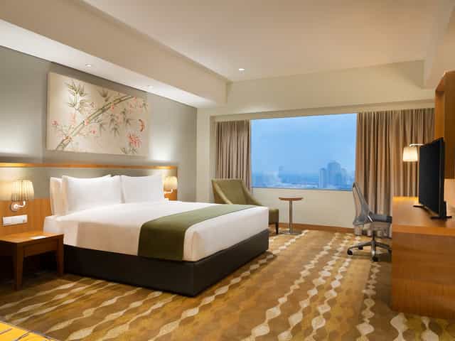 Harmony Grand Ballroom with ergonomic workspace for corporate events and VIP business meetings.