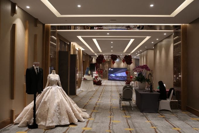 Harmony Grand Ballroom wedding showcase setup with elegant pre-function display area.