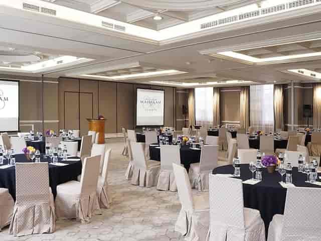 Magnolia Ballroom at Hotel Gran Mahakam with banquet setup for upscale corporate events or weddings.