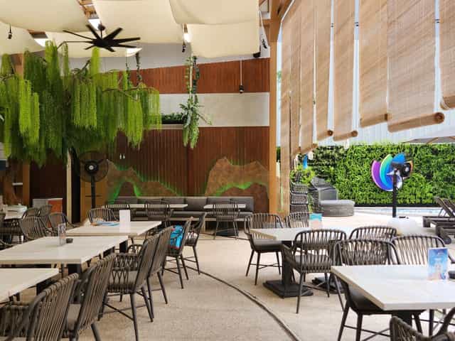 Pastis Pool Bar Jakarta: Semi-outdoor venue with biophilic design for networking and events.