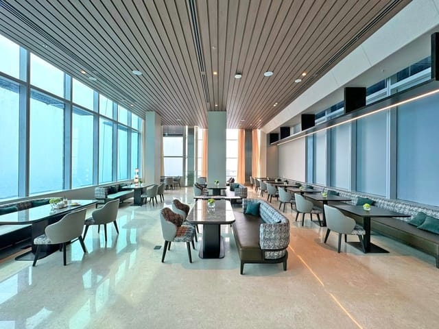 High-end Bar at Pan Pacific Jakarta with floor-to-ceiling windows for corporate networking events.
