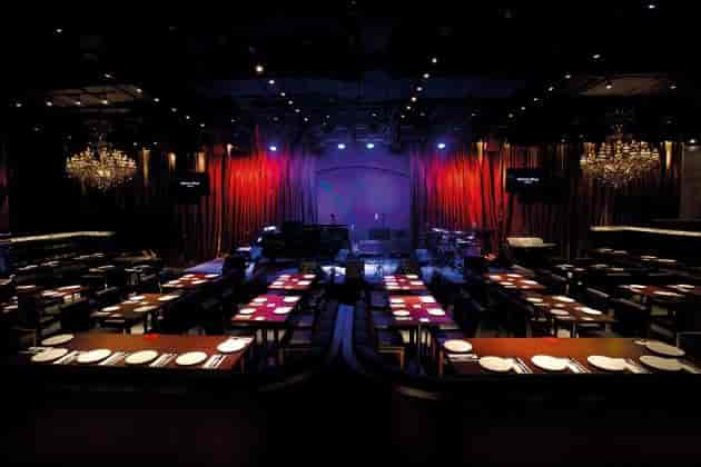 Motion Blue Jakarta supper club with stage lighting for corporate dinners and awards galas.