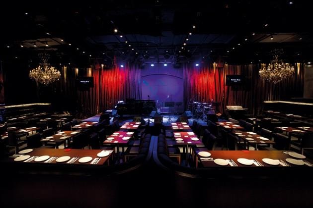 Motion Blue Jakarta supper club with stage lighting for corporate dinners and awards galas.