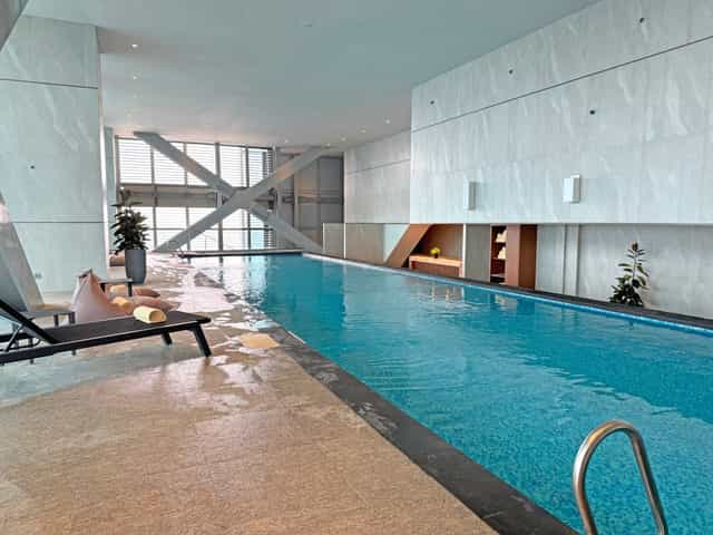 Contemporary indoor lap pool at PARKROYAL Jakarta for executive wellness and incentive travel.