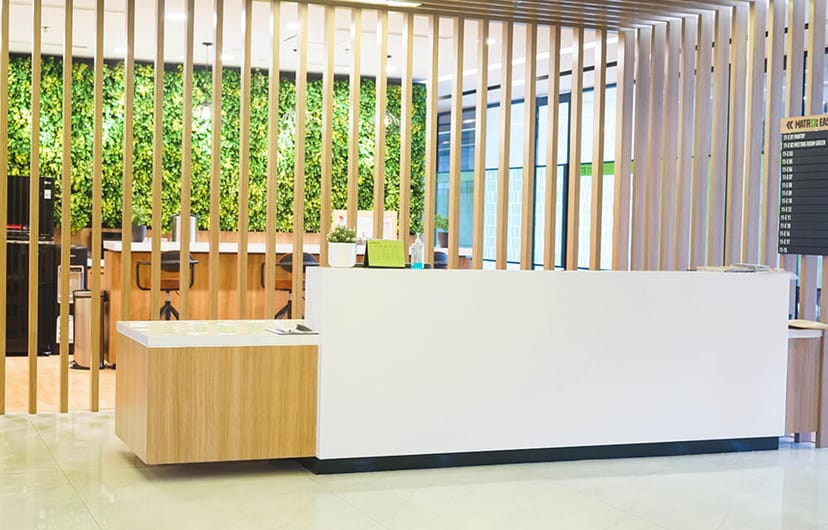 Modern MATRIX Smart Suite reception, biophilic design, corporate event check-in, business venue.