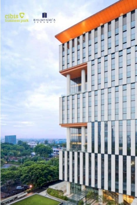 Modern skyscraper with inset terrace for premium corporate events and business networking.
