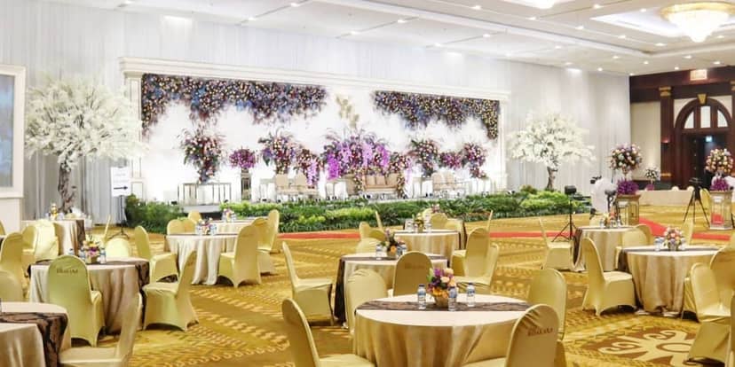 Ballroom at Hotel Bidakara Jakarta: floral stage for weddings and formal gala events.
