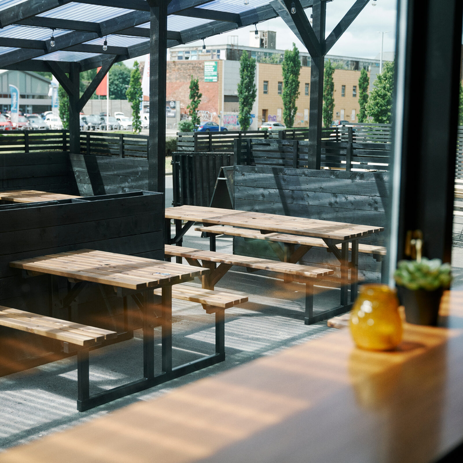 Industrial outdoor breakout area at Archive Leeds for networking and alfresco events. - Banner