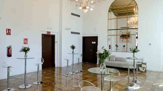 Elegant Trocadero Venue with chandelier; ideal for upscale events and gatherings.