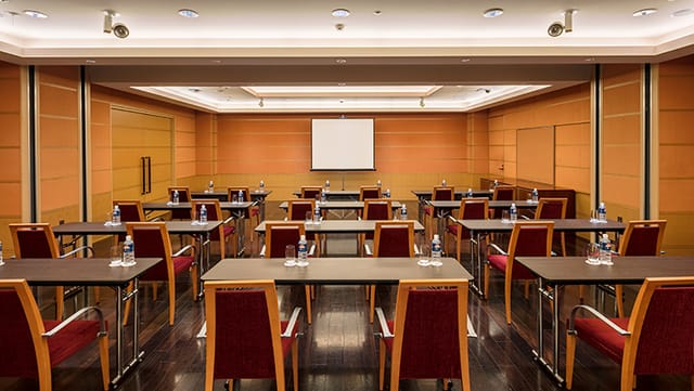 Brooklyn Suite schoolroom setup, Tokyo American Club meeting room for professional training events.