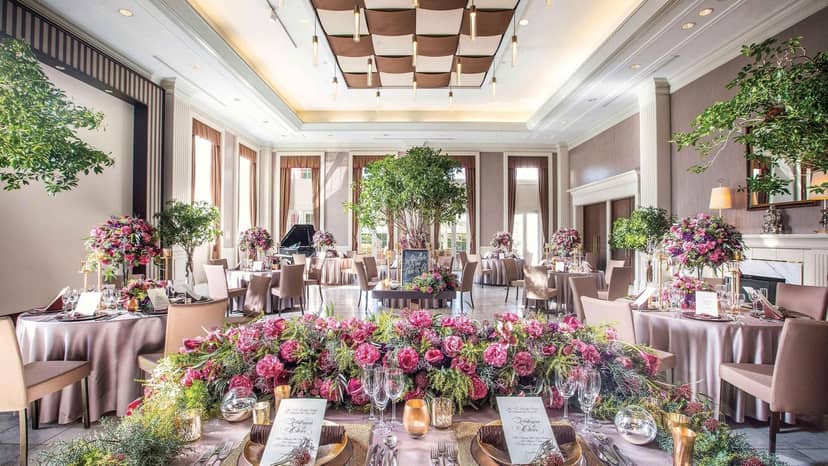 Elegant Tokyo Bay ballroom with floral decor for luxury wedding and gala event hosting.