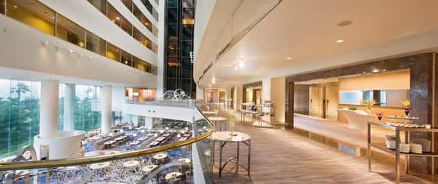 Hilton Tokyo Bay banquet hall, tiered atrium for corporate events and cocktail receptions.