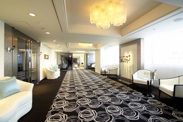 Fuyo pre-function area at Hotel New Otani Tokyo featuring modern seating for networking events.