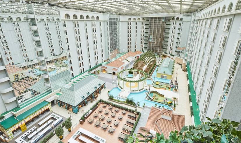 Grand Nikko Tokyo Bay hotel glass atrium, ideal for large-scale corporate conferences and events.